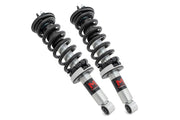 M1 Par de Struts Cargados | 2.5 Inch | Nissan Frontier 4WD (2005-2026)