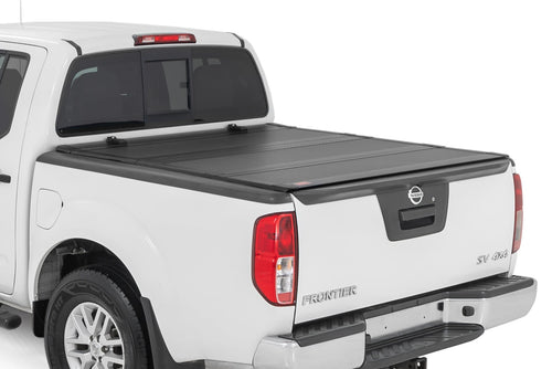 Tapa de Caja Tri-Fold Plegable para Nissan Frontier (05-21)