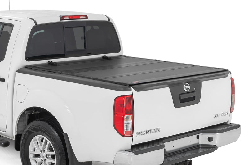 Tapa de Caja Tri-Fold Plegable para Nissan Frontier (05-21)